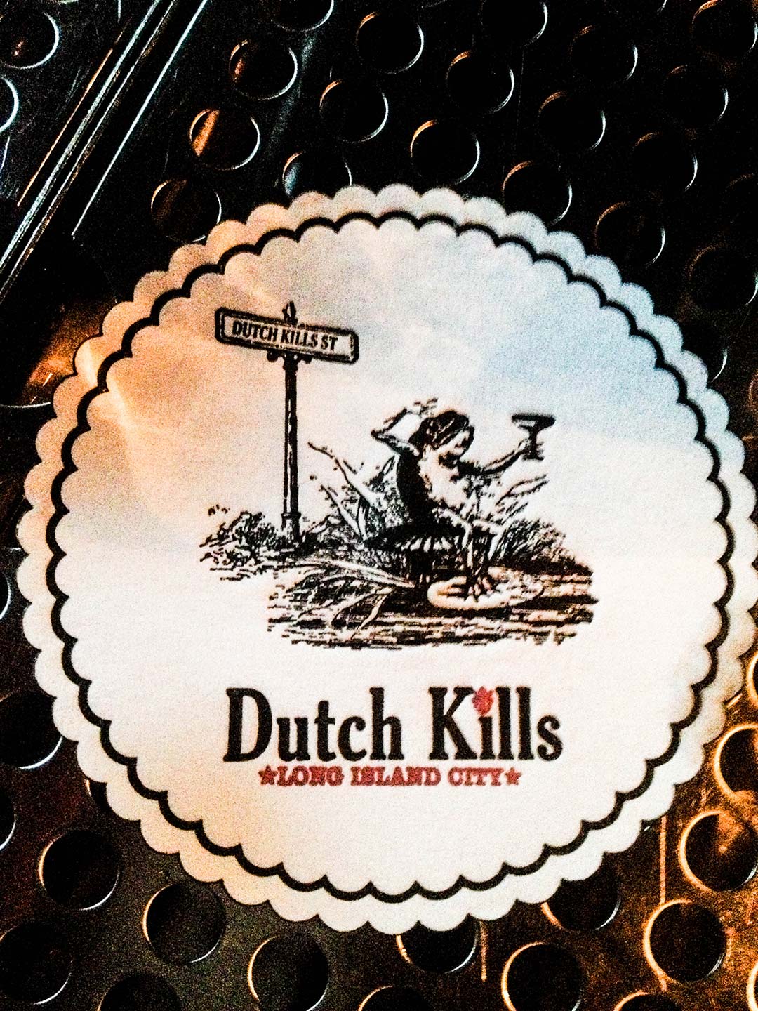 Dutch Kills frog with cocktail drink coaster letterpress printed with scalloped edges