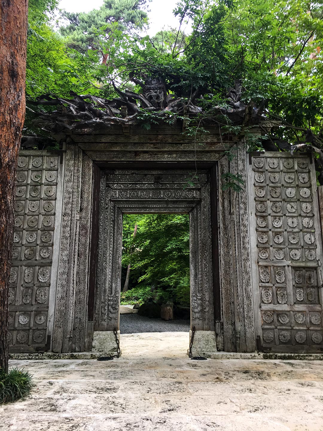 Ornate stone entrance to  Itchiku Kubota kimono Museum